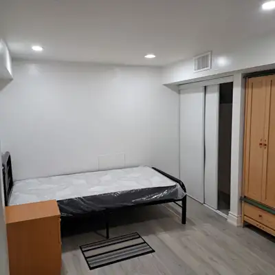 Bachelor male private room with shared kitchen and bathroom on Basement floor for rent immediately....