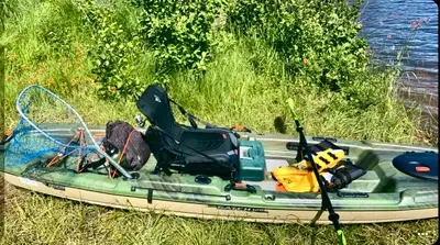 Pelican Catch 120 Angler kayak with truck bed craddle. Items- Pelican Catch 120, paddle, life jacket...