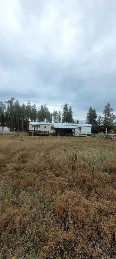 2 bedroom mobile on acreage 10 min from town. 1 year lease. Pet friendly. Fenced yard . Available Fe...