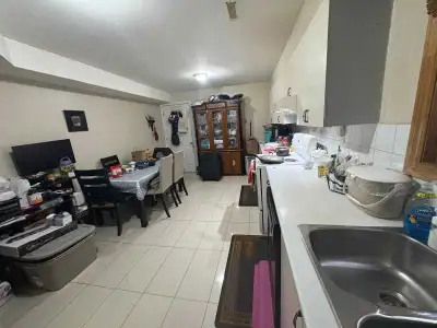 2 bedroom basement main floor close to square one, including laundry, 1 parking , plus 30% utility