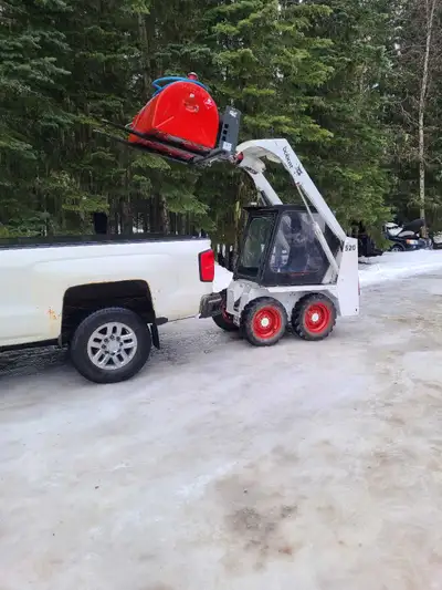 I'm selling a used BOBCAT 520 26 hp Honda gas engine skid steer, known for its compact size and 4x4...