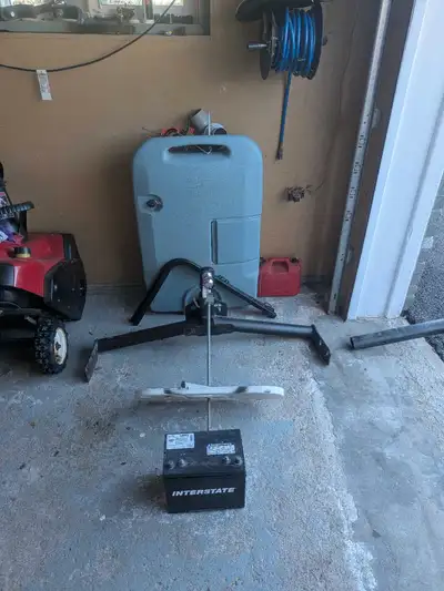 One battery,one honey pot,one double propane holder used one season these are in Saint John NB