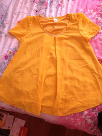 yellow short sleeve blouse with gold neck decor