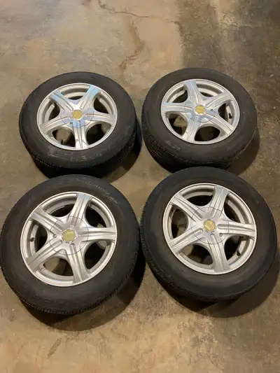 Tires: -P185/65R14 Cooper CS3 Touring -6/32nds of tread remaining on all 4 tires Rims: -14x6 with 72...