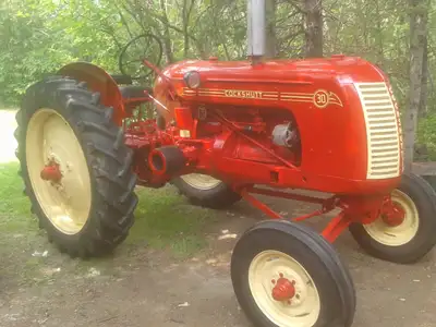 Cockshutt 30 tractor with good rear tires and new front,original lights,new steering wheel,tool box...