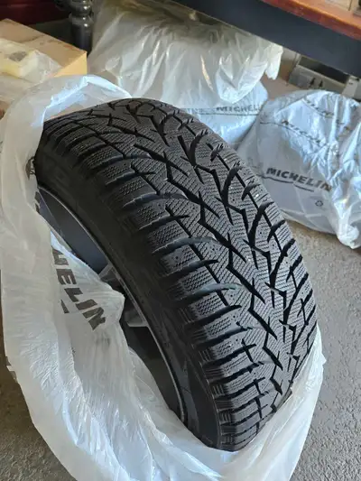 4 Toyo Observe winter tires on rims. Used the rims for 3 winters and the tires are almost new. Ran t...