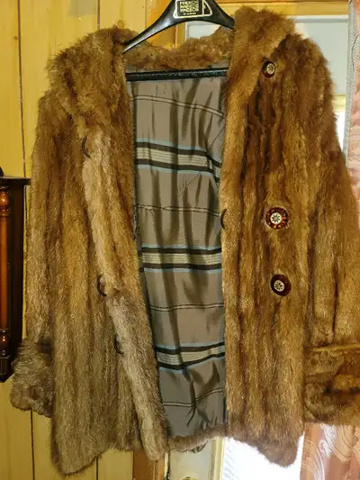 2 Woman's Fur Coats, View more
