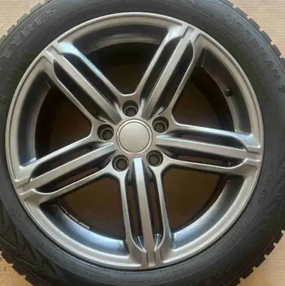 Great Rim and Norkian Nordman7 winter tires from and Audi A4. Used less that one season. Traded the...