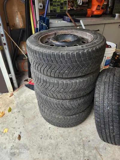 Used tires on rims. Came off a 2013 Ford Fusion. Tread depth between 6-8/32nds approx 60% tread. Pic...