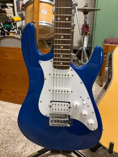 Nice little beginner guitar it sounds great comes with a softshell case available in North Edmonton...