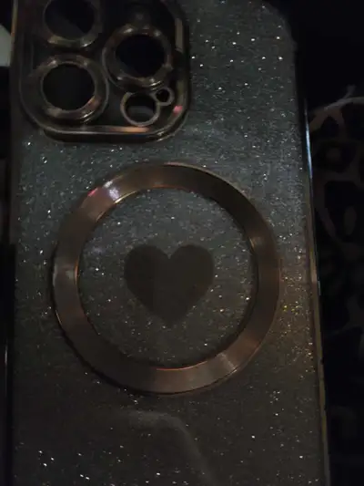 Add a touch of sparkle to your phone with this glittery iPhone case, designed to fit snugly and prot...