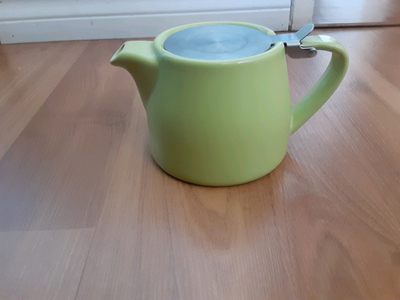 4 inches tall by 4 inch base by 3 inch diameter at top Comes with mesh diffuser