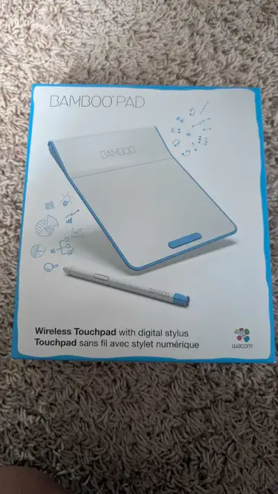 Selling a Wacom Bamboo Pad, a wireless touchpad with a digital stylus, perfect for artists and desig...