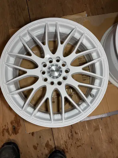 White Maxxim Rims, used for a summer. Wanting to get different ones. Can deliver, if out of town for...