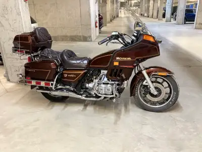 Experience smooth touring on this classic 1983 Honda Goldwing Interstate 1100, featuring a powerful...