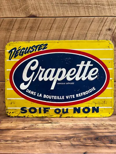 Enseigne GRAPETTE année 50’ 19 1/2’’ x 17 1/4’’ Merci