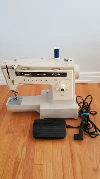 SINGER STYLIST 534 SEWING MACHINE, View more