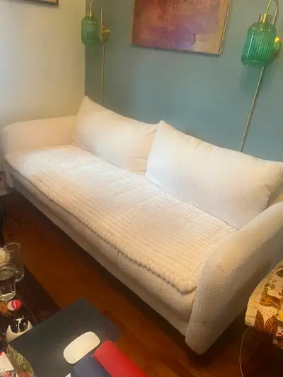 Selling a cream-colored upholstered sofa purchased from Structube in near-new condition. “Cream bouc...
