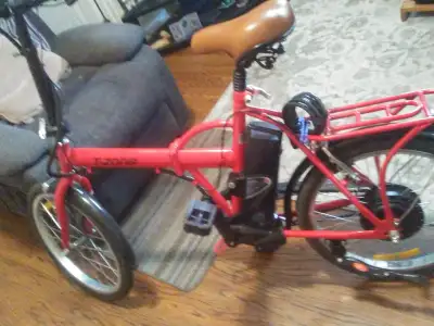 I have a Ebiks and it folds i half it weighs 60lbsita a 36v, View more