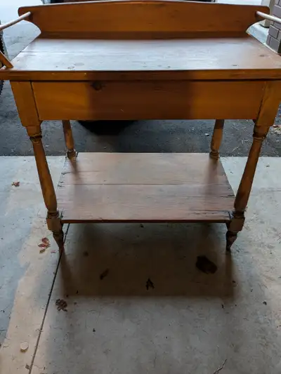 Old Antique Washstand in natural wood finish. Table Height 28", 31" to top of trim at back. Top widt...