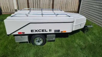 This trailer comes with all the goodies. It has been stored in doors from the day of purchase. We us...