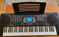 CASIO CTK 533 synthesizer keyboard with 100 song bank. 37” wide.