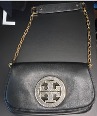 Tory Burch clutch great condition used less than 5 times. 