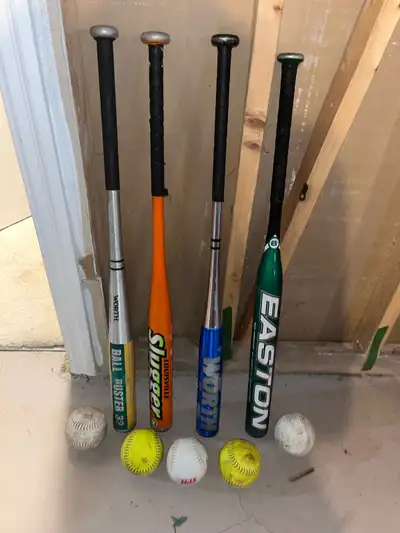 Softball bats and balls 