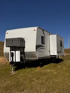 2011 26 foot KZ Camper Tag Trailer. One large slide with Queen Bed. Excellent shape, a nice couples...