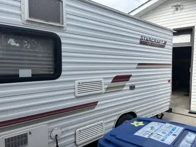 Great trailer, pull out bed, microwave, air conditioning and heat,new tires tows light awning sleeps...