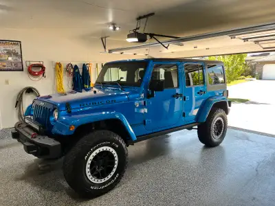 2014 Jeep JK Unlimited Rubicon, 3.6L, auto. 2” Mopar lift with Fox shocks, steel rubicon 10th annive...