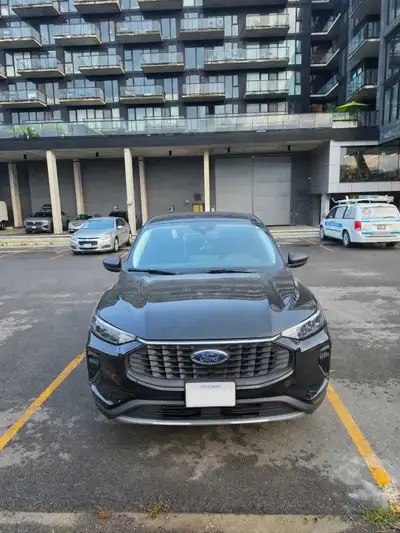 This is a gently used Ford Escap activeAWD, featuring a modern digital dashboard and a large, intuit...