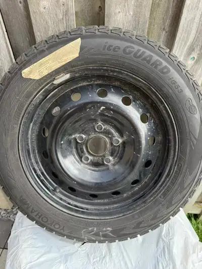 Selling a set of 4 Yokohama iceGUARD iG53 winter tires mounted on steel rims. Used on a Volkswagen J...