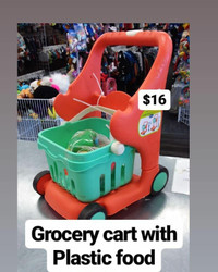 Toy Grocery cart with plastic food.