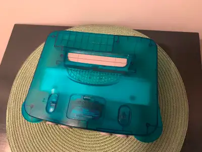 Funtastic Ice Blue/clear Nintendo 64. It’s a colour variation from Japan. It has the North American...