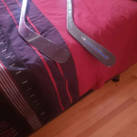 2 Easton hockey sticks