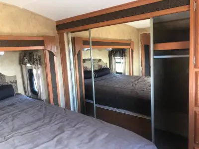 5th Wheel Camper Unit with 3 slides making it like a beautiful cabin with nice bright bathroom. Full...