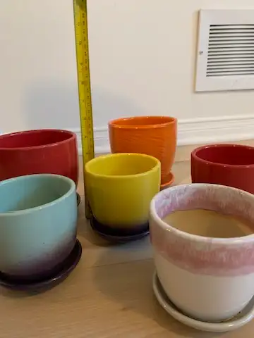 Multiple small plant pots, View more