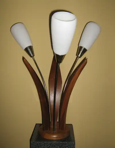 Stunning flower shaped Danish Modern inspired table lamp in teak and brass with three frosted glass...