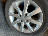 4 Mazda aluminum rims & tires