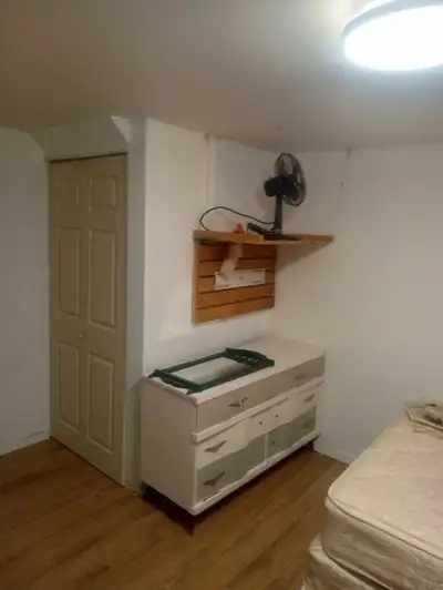 Furnished basement bedroom for rent close to southgate duggan