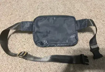 New belt bag Color is a blue/grey $15