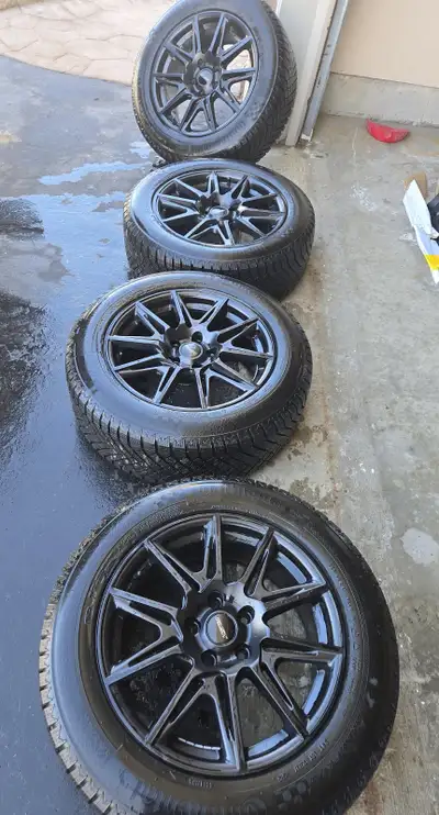 Selling 4 Fast Wheels Switch rims with Viking 8 225/60/17 winter tires on them. Used about 2 months...