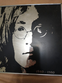 framed photo of john Lennon