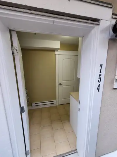 Location, Location, Location! Welcome home to this beautifully finished laneway house in the heart o...