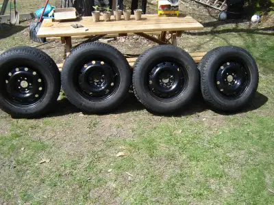 Set of 4 215 65 16 Altimax Arctic winter tires mounted on steel rims (Honda CRV) Bolt Pattern 5X4.5...