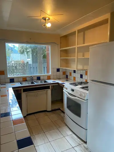 Awesome four-bedroom character home for rent in Nelson, with a huge forested yard, cedar shingle roo...