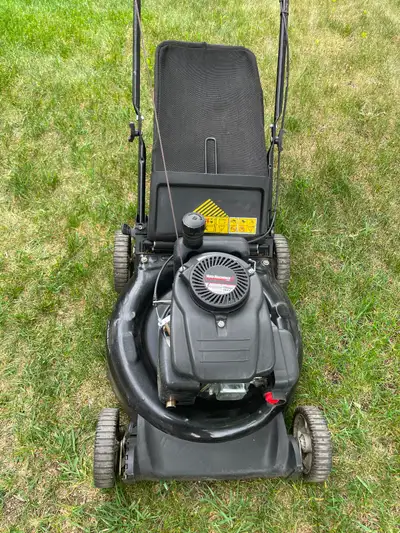 Yard machines gas lawnmower starts easy and runs great, View more