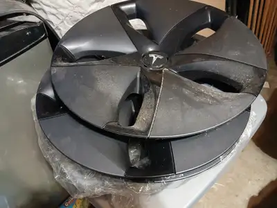 Stored carefully since 2018 set of 4 aero wheel covers, very few scratches practically brand new. $3...
