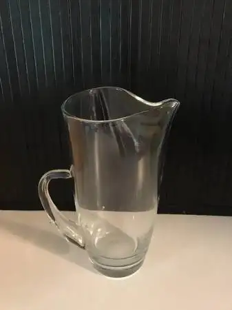 Collectible Glass pitcher holds 3 cups - $10, View more